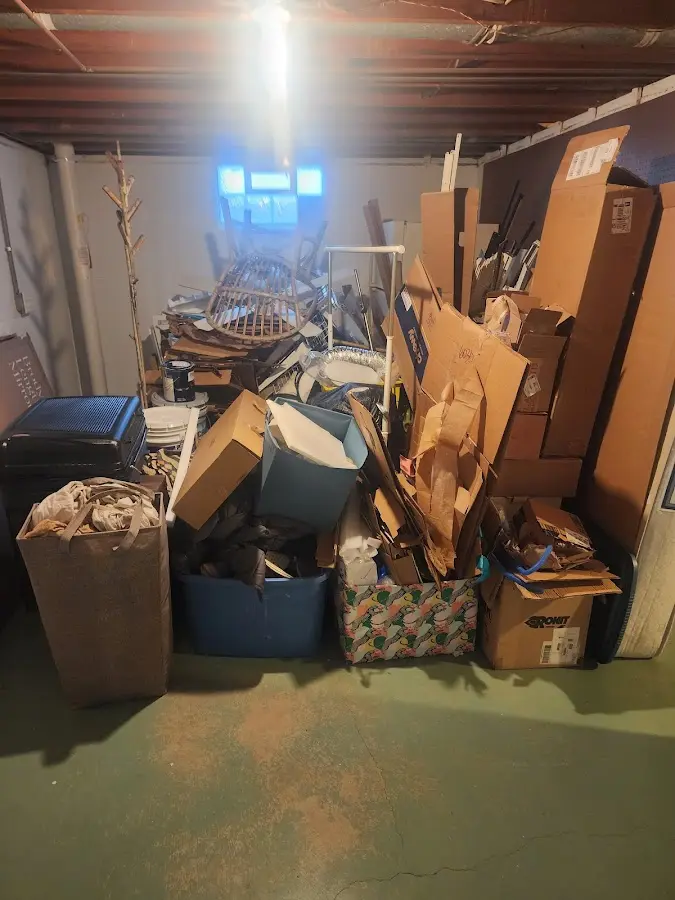 Roll-off dumpster container at job site for Cleanout Dumpster Rental in Amityville